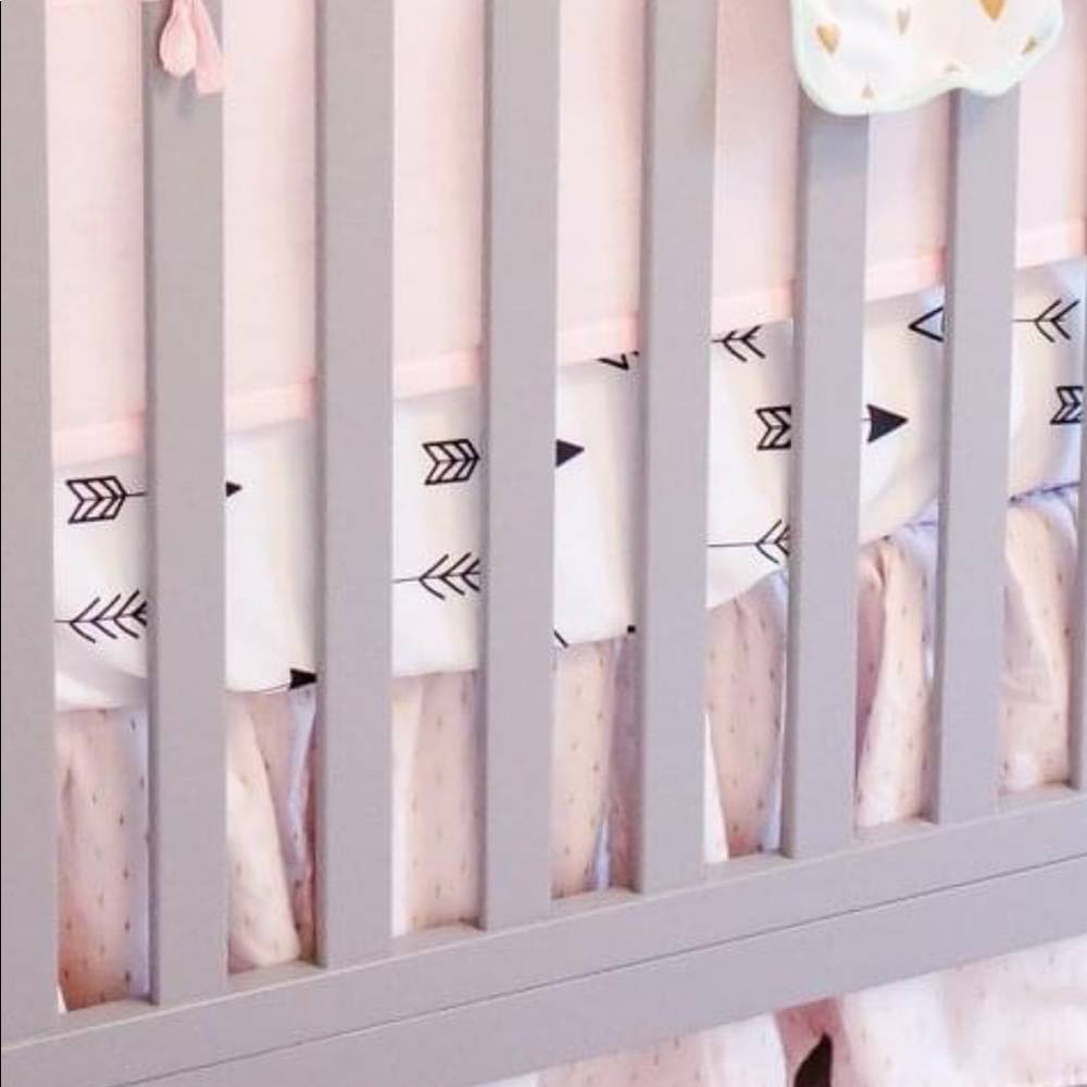 Crib skirt & breathable mesh liner.